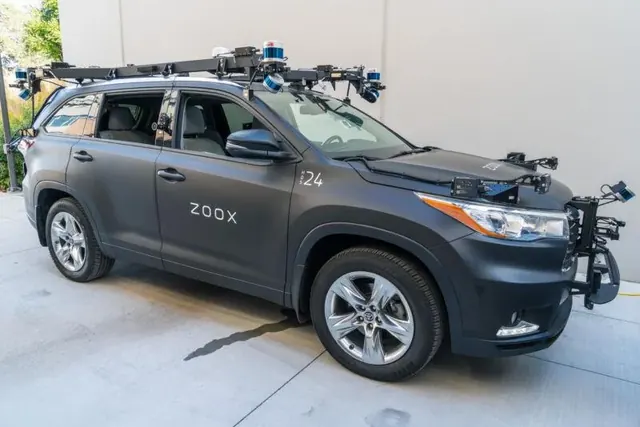Zoox retrofit test vehicle with full roof sensor rig