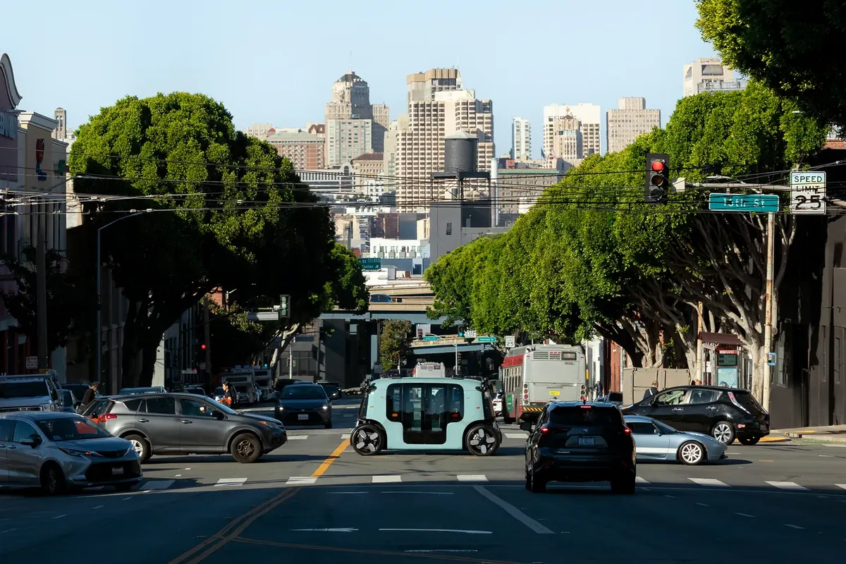 Zoox robotaxi crossing a San Francisco intersection